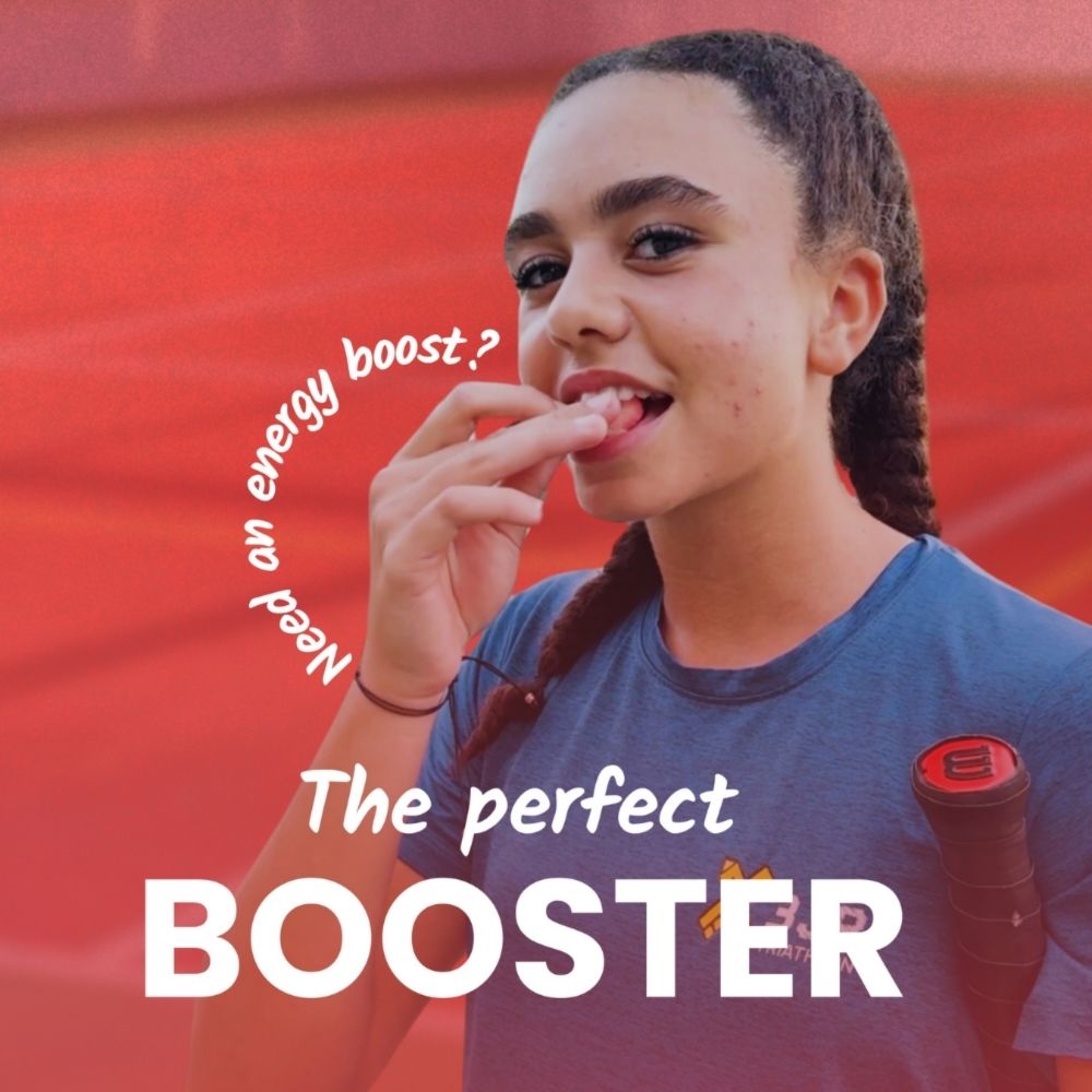 Person eating a snack with text about an energy boost on a red background