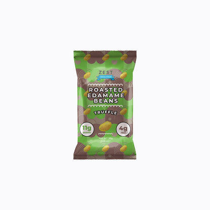 A 24-pack display box of Zest Zestix Mango Apple Based Dried Fruit Bars, featuring multiple individually wrapped bars fanned out from a black cardboard tray with fruit illustrations and a few fresh mangoes and an apple on a white background.